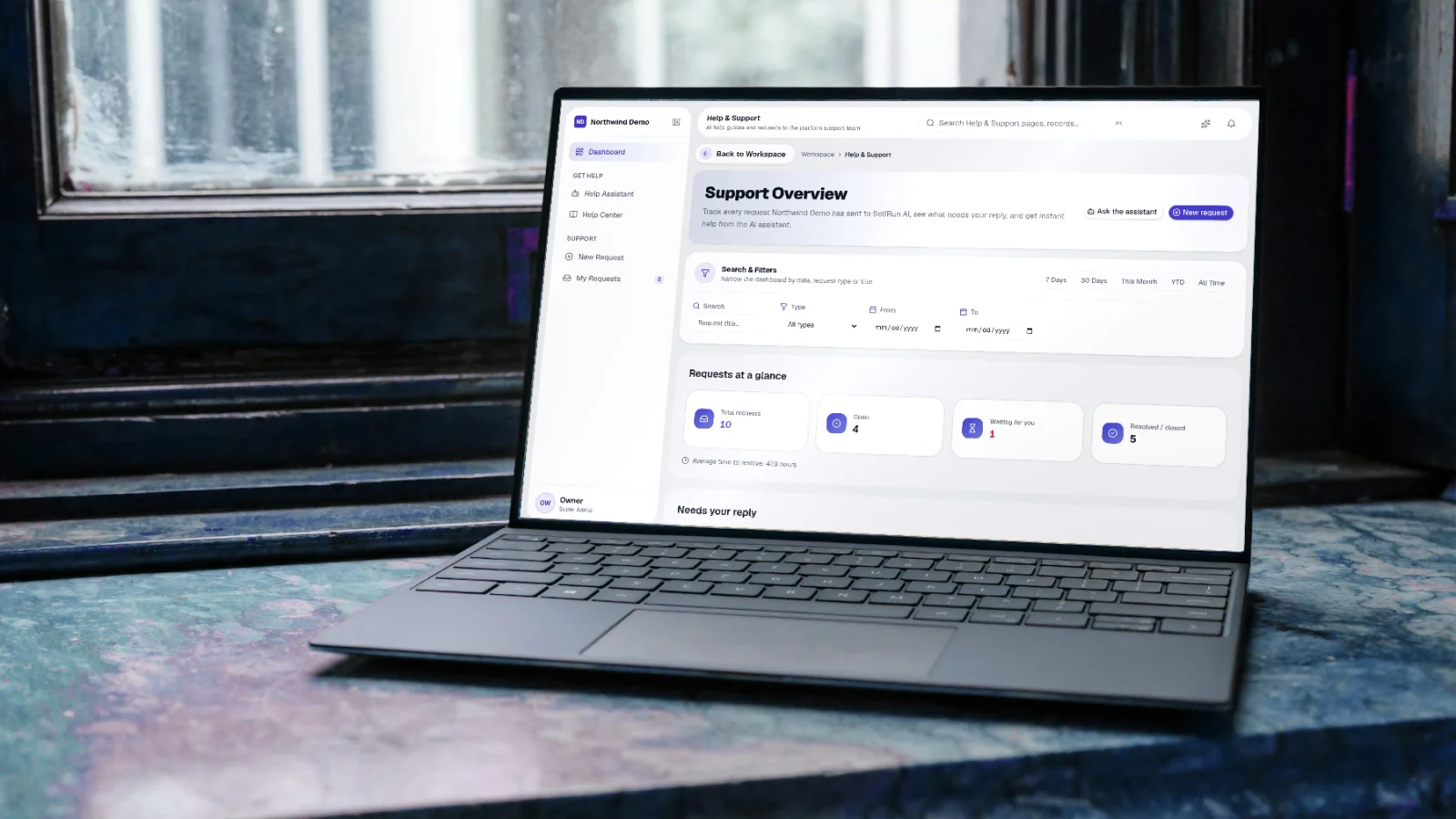 SelfRun ResolveIQ — real screen of the product on a laptop