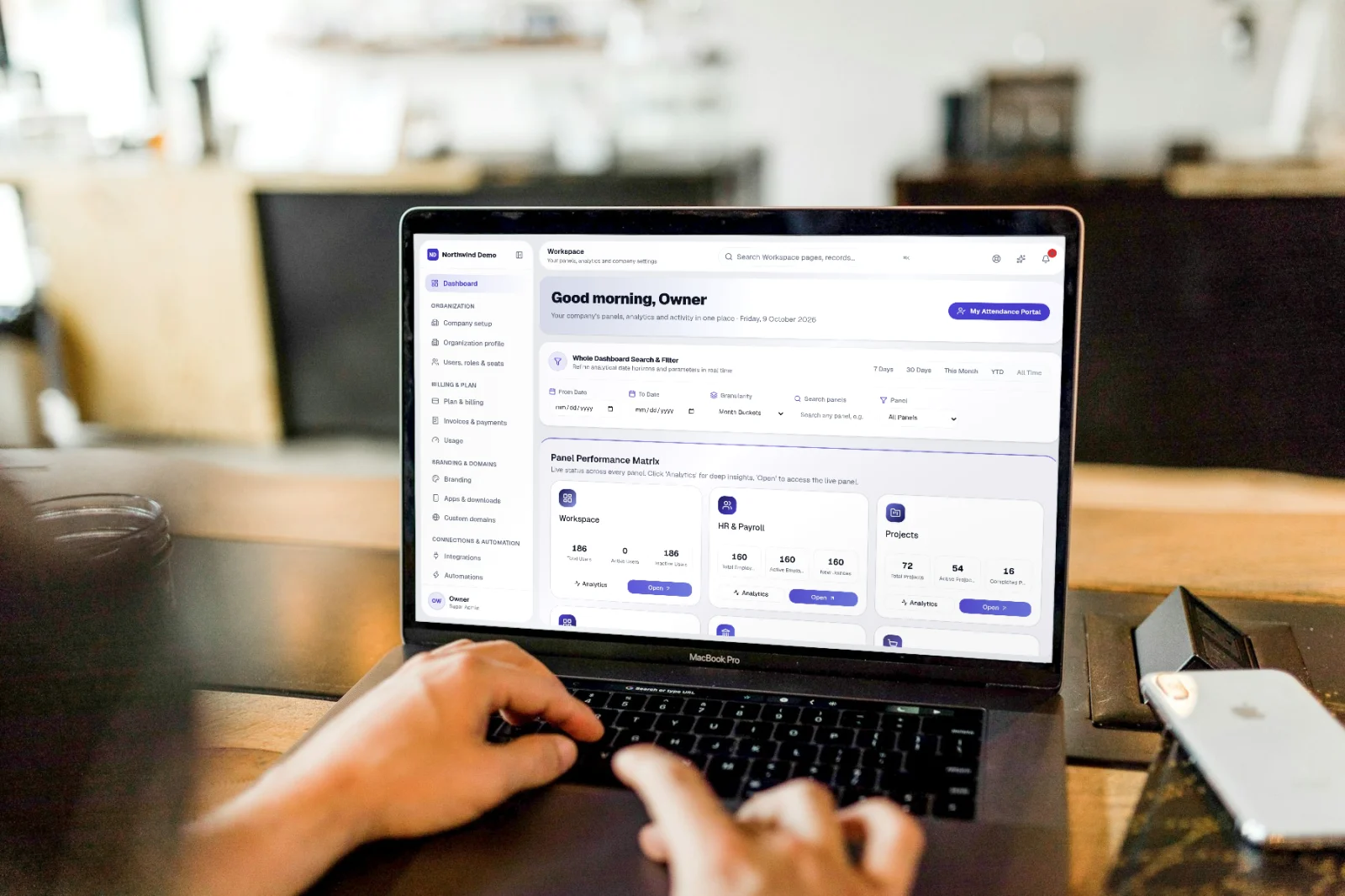 Workspace — real screen of the product on a laptop